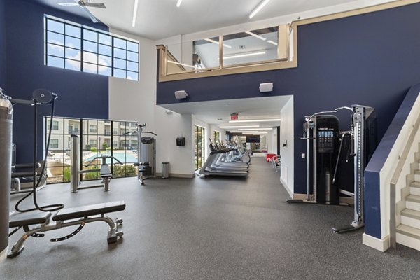 fitness center at The Sterling at Oak Hills Apartments