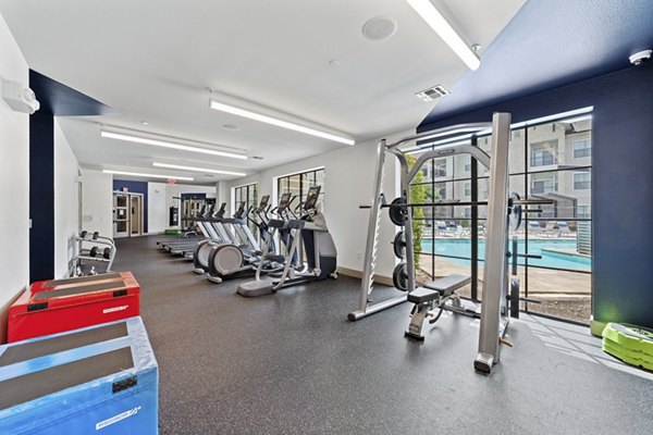 fitness center at The Sterling at Oak Hills Apartments