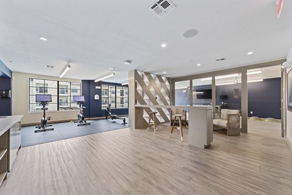 fitness center at The Sterling at Oak Hills Apartments