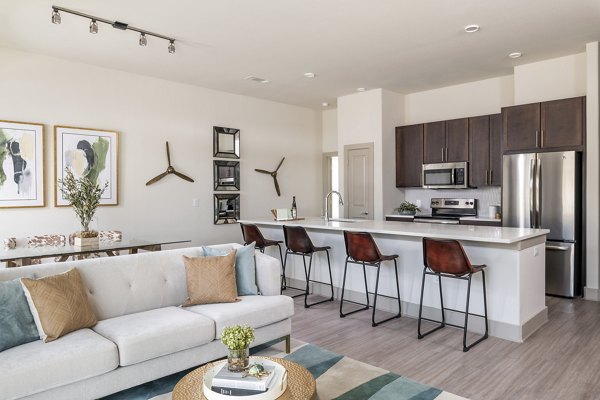 living room at The Sterling at Oak Hills Apartments