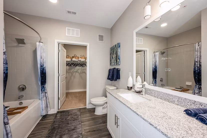Bathroom featuring modern fixtures and marble finishes at Broadstone River House Apartments