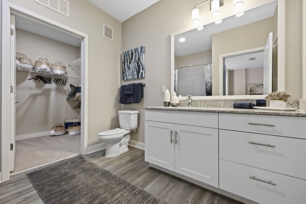 Bathroom featuring modern fixtures and marble finishes at Broadstone River House Apartments