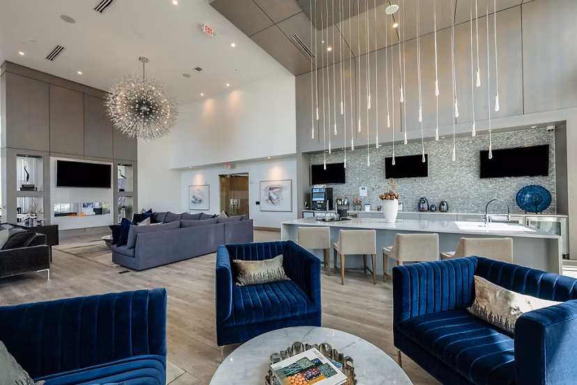 Broadstone River House: Modern clubhouse with stylish seating and natural light in Jacksonville luxury apartments