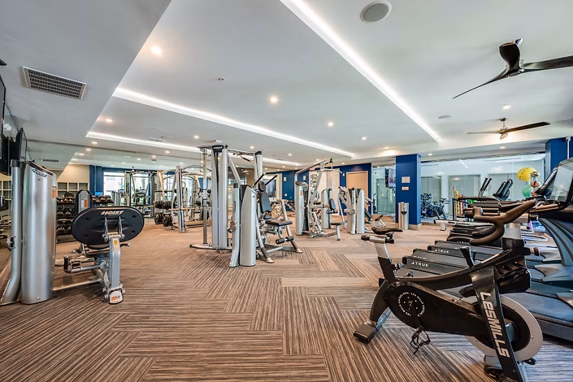 Fitness center with modern equipment at Broadstone River House Apartments