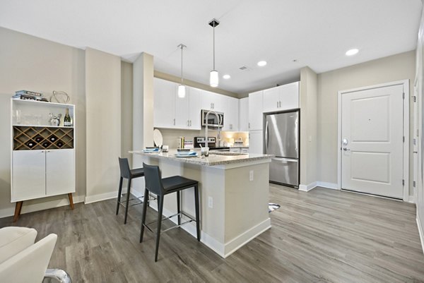 Modern kitchen with sleek stainless steel appliances at Broadstone River House Apartments