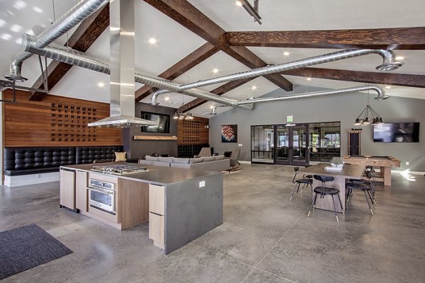 Modern clubhouse with lounge and entertainment areas at Meridian Apartments