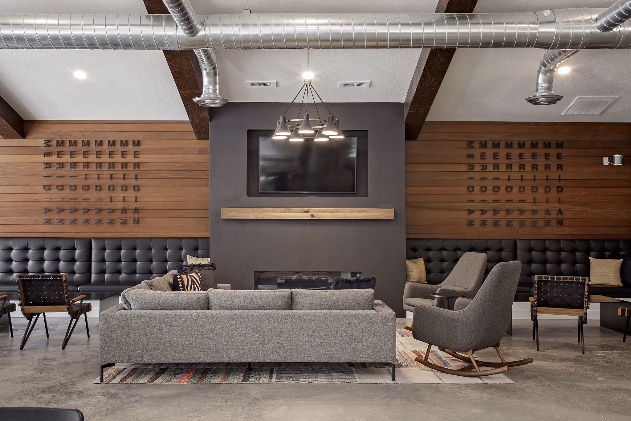 Clubhouse featuring modern design and cozy seating at Meridian Apartments