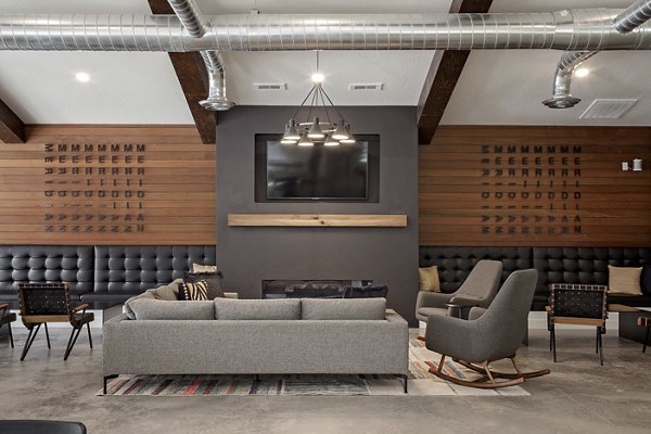 Clubhouse featuring modern design and cozy seating at Meridian Apartments
