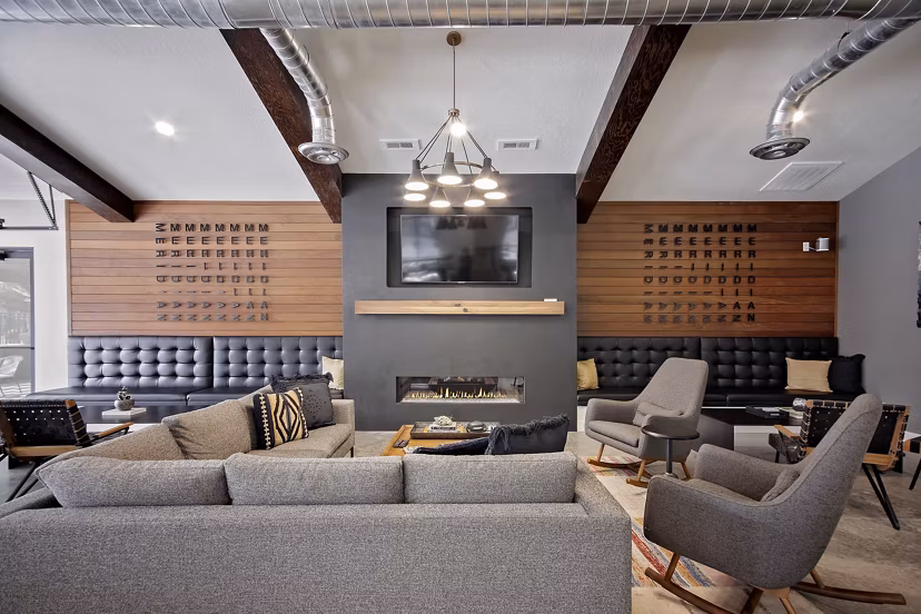 Clubhouse featuring modern design and seating areas at Meridian Apartments