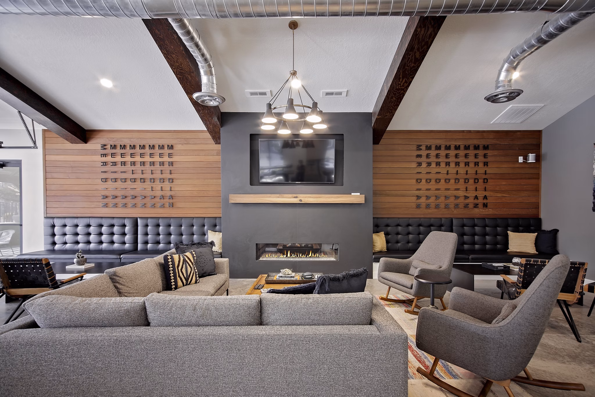 Clubhouse featuring modern design and seating areas at Meridian Apartments