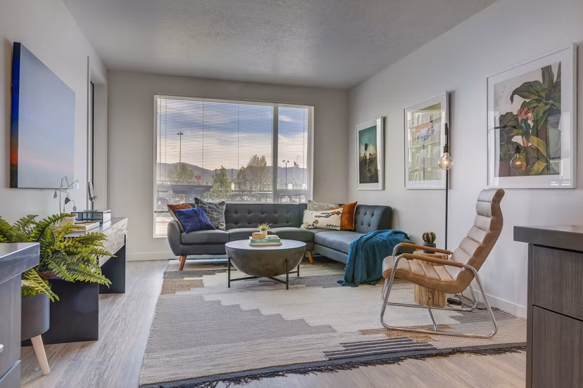 Modern living room with chic furnishings at Meridian Apartments