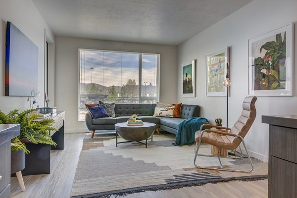 Modern living room with chic furnishings at Meridian Apartments