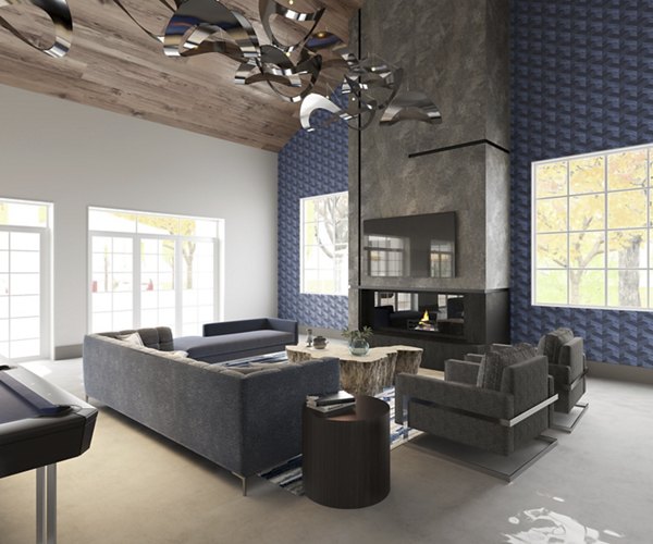 Inova Apartments: Elegant clubhouse featuring modern design and cozy seating options