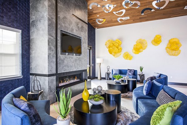 Inova Apartments: Stylish clubhouse featuring modern design and ample seating for resident gatherings