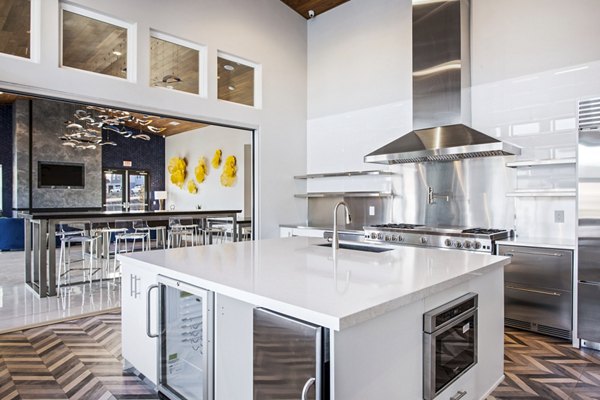 Contemporary clubhouse kitchen with modern appliances at Inova Apartments, offering luxury living for residents