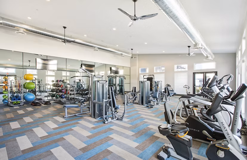 State-of-the-art fitness center with modern equipment at Inova Apartments for active residents seeking luxury living