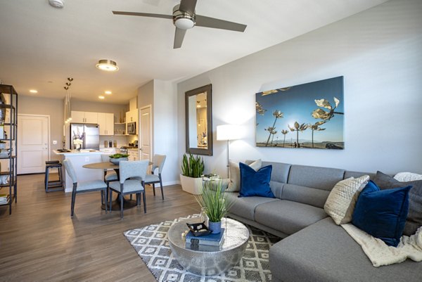 Spacious living room with modern furnishings in Inova Apartments, luxury residences by Greystar