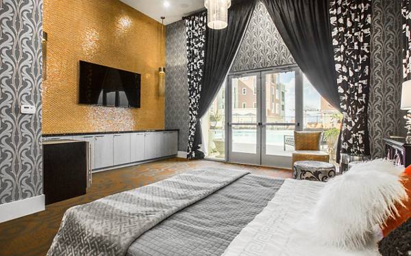 bedroom at Elysian at the District Apartments