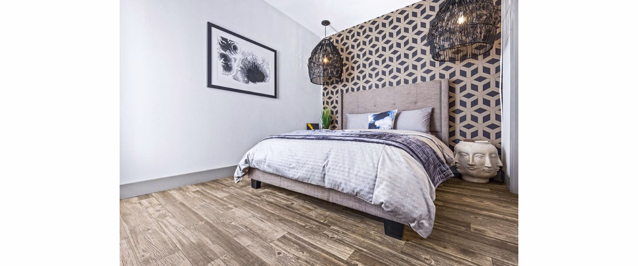 Spacious bedroom with modern furnishings in Reverb at Spring Valley Apartments
