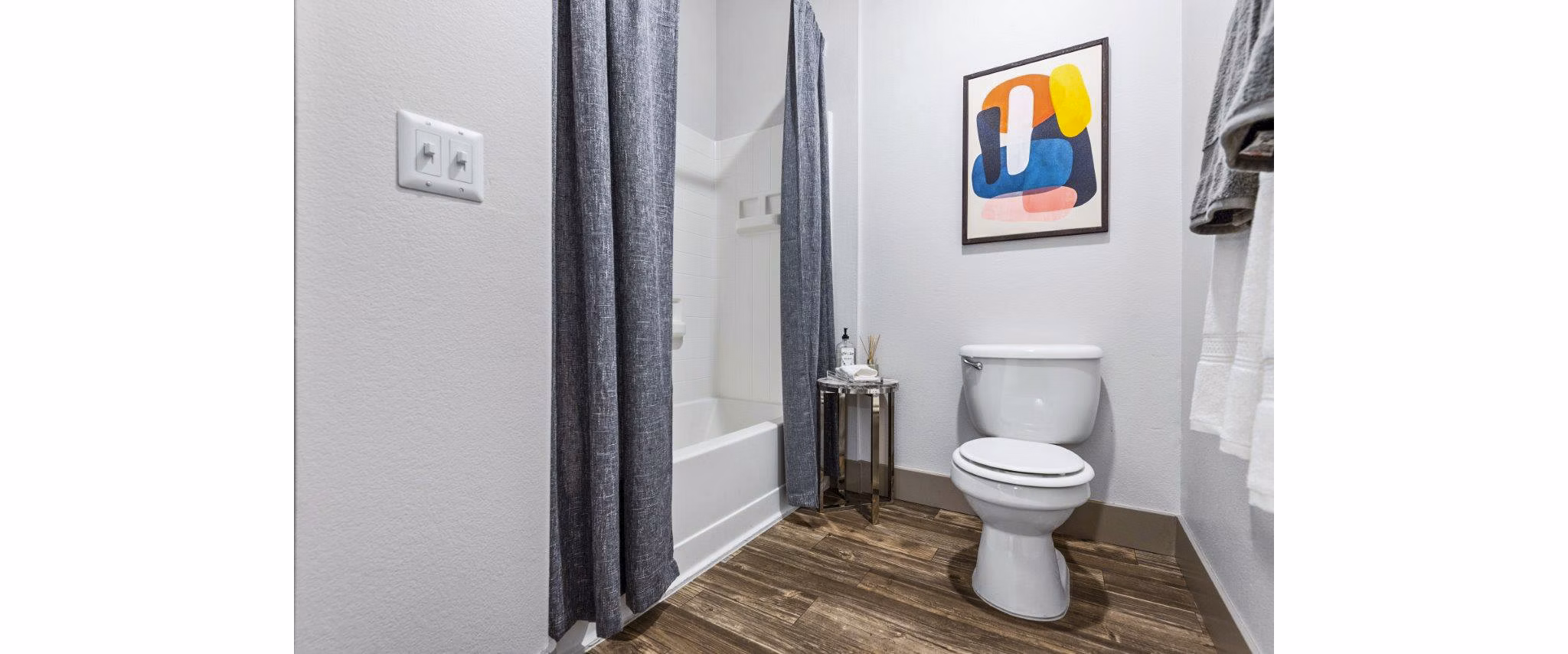 Bathroom featuring sleek countertops and modern fixtures at Reverb at Spring Valley Apartments