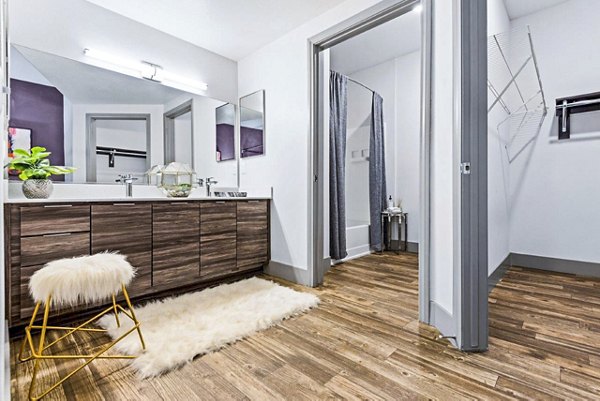 Luxurious bathroom featuring sleek fixtures and modern design at Reverb at Spring Valley Apartments