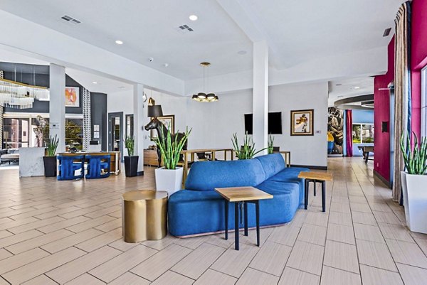 Clubhouse with modern decor in Reverb at Spring Valley Apartments offering luxury living