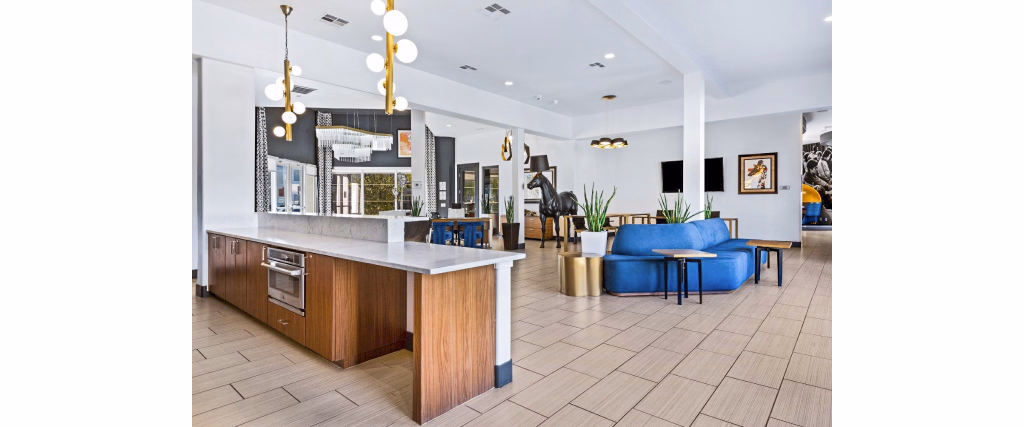 Clubhouse/lobby with elegant seating and decor at Reverb at Spring Valley Apartments, a Greystar luxury property