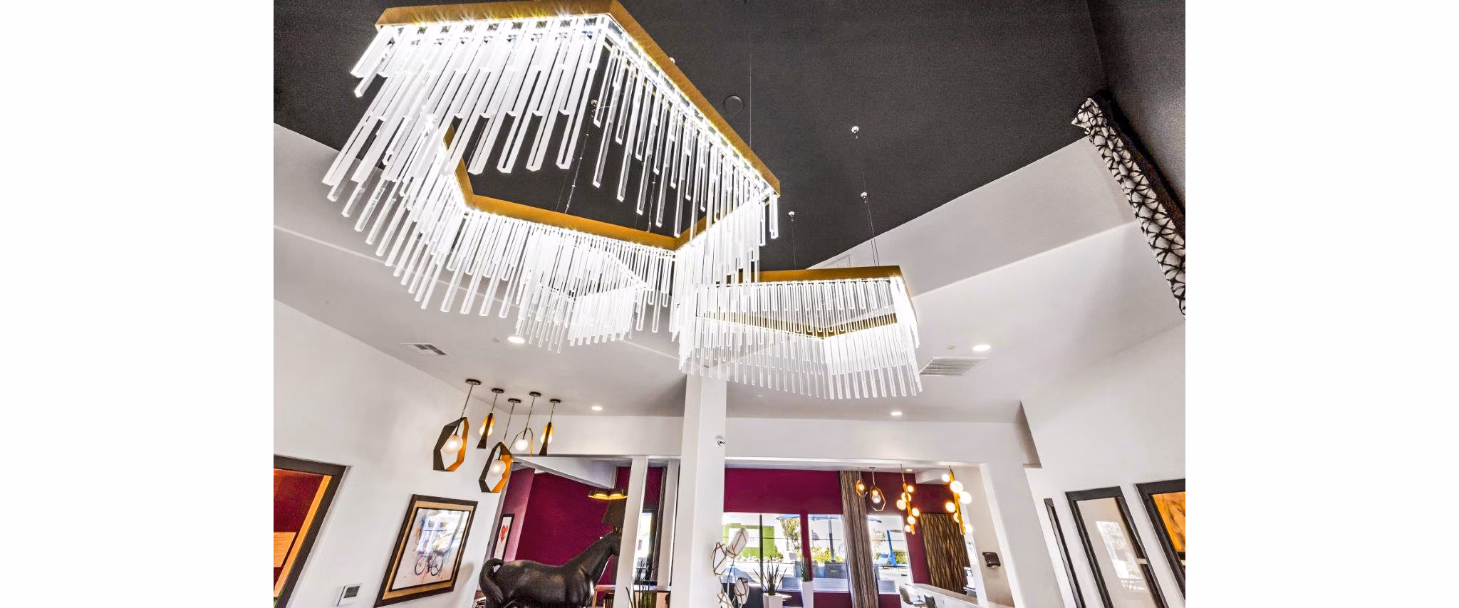 Lobby lounge featuring modern furnishings at Reverb at Spring Valley Apartments