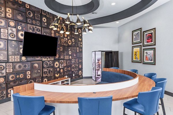 Clubhouse with modern decor at Reverb at Spring Valley Apartments, a luxury living community in a serene setting