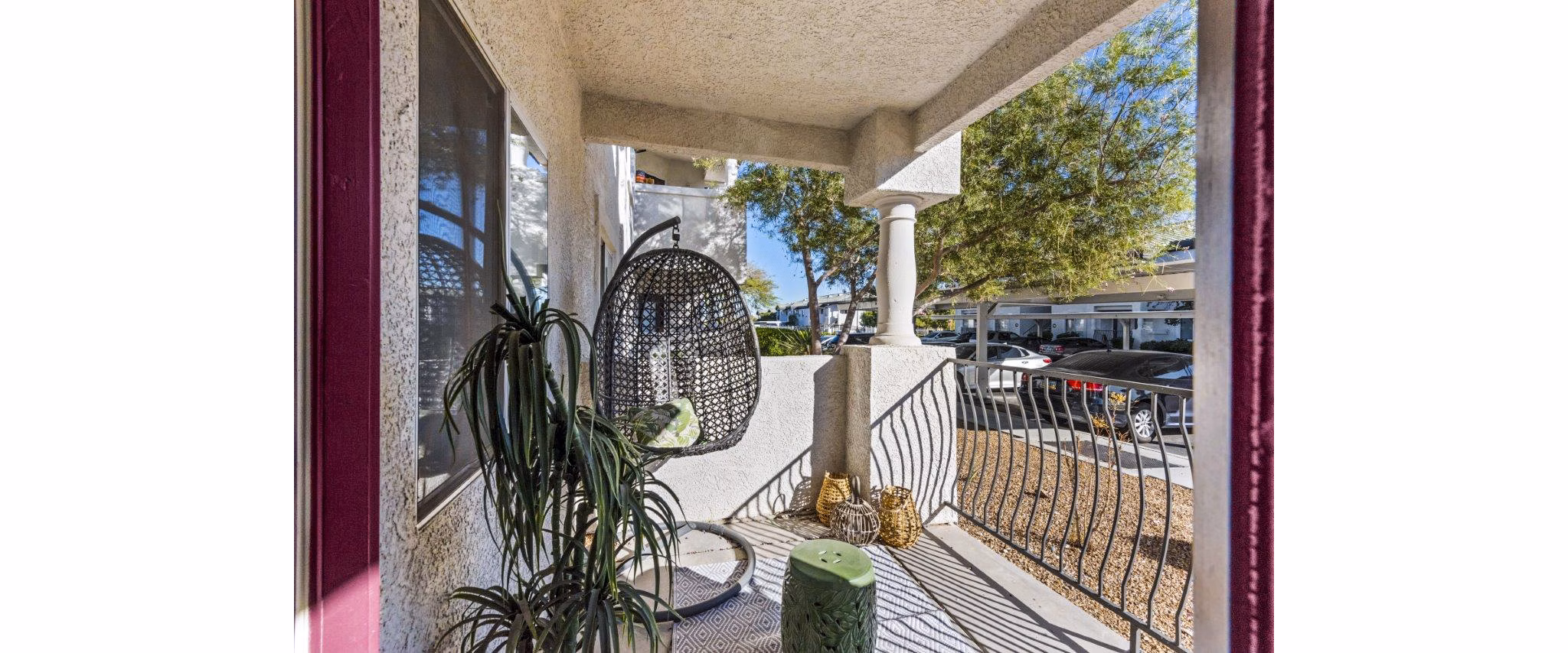 Outdoor patio with stylish seating at Reverb at Spring Valley Apartments
