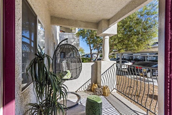 Outdoor patio with stylish seating at Reverb at Spring Valley Apartments