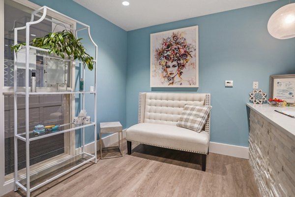 Hair salon waiting area with stylish decor at The Ivy at Draper Apartments, offering luxury and convenience for residents