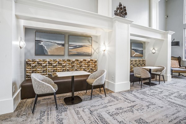 Ivy at Draper Apartments: Welcoming clubhouse with modern decor and seating areas