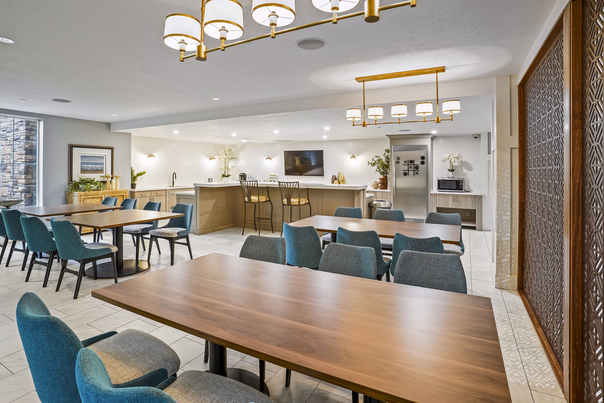 Clubhouse with modern decor and cozy seating at The Ivy at Draper Apartments