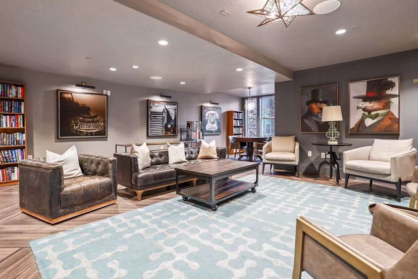 Clubhouse with stylish seating and modern decor at The Ivy at Draper Apartments