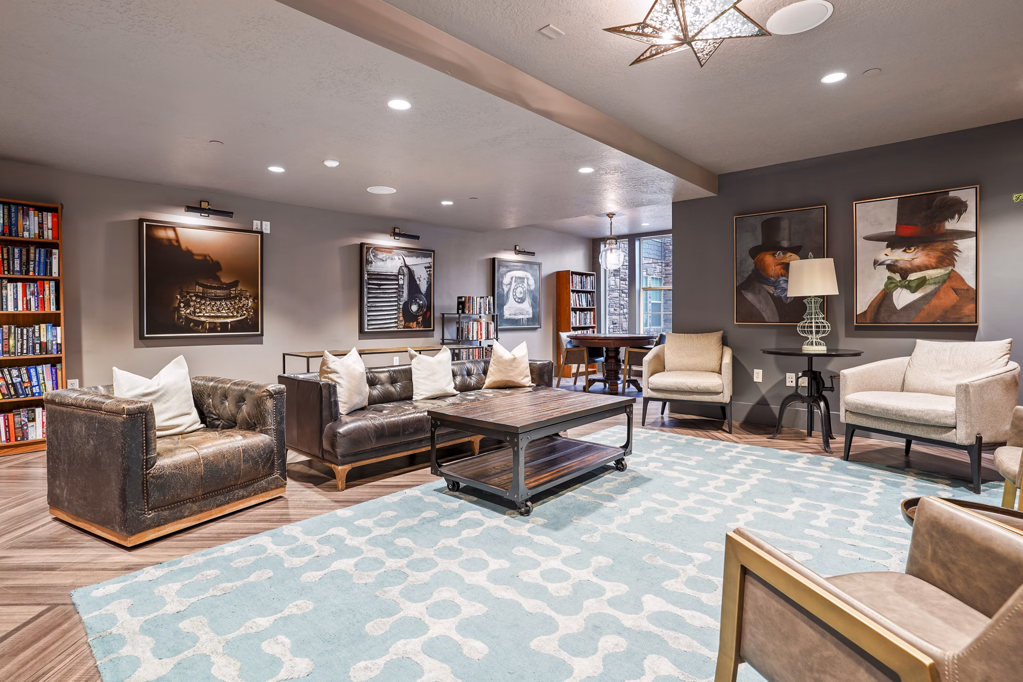 Clubhouse with stylish seating and modern decor at The Ivy at Draper Apartments