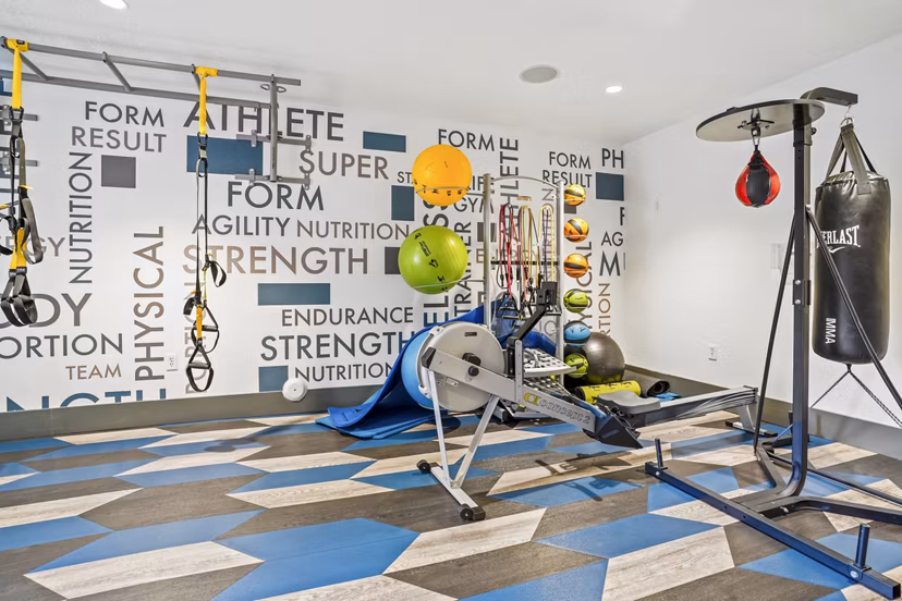 State-of-the-art fitness center with modern equipment at The Ivy at Draper Apartments