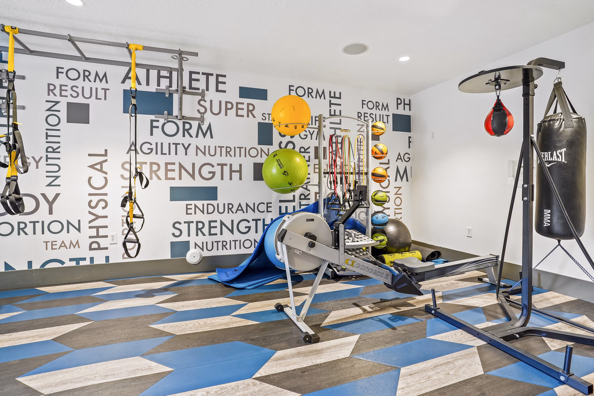 State-of-the-art fitness center with modern equipment at The Ivy at Draper Apartments