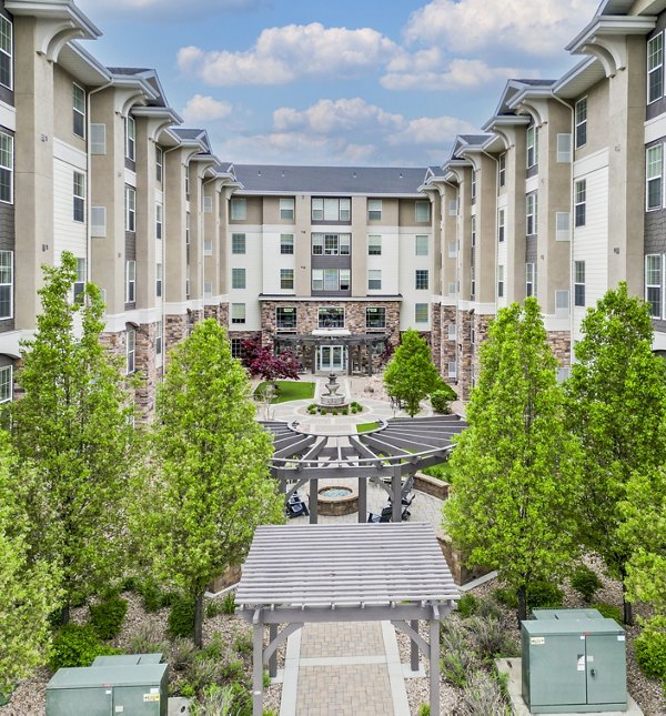 Courtyard featuring modern seating area at The Ivy at Draper Apartments