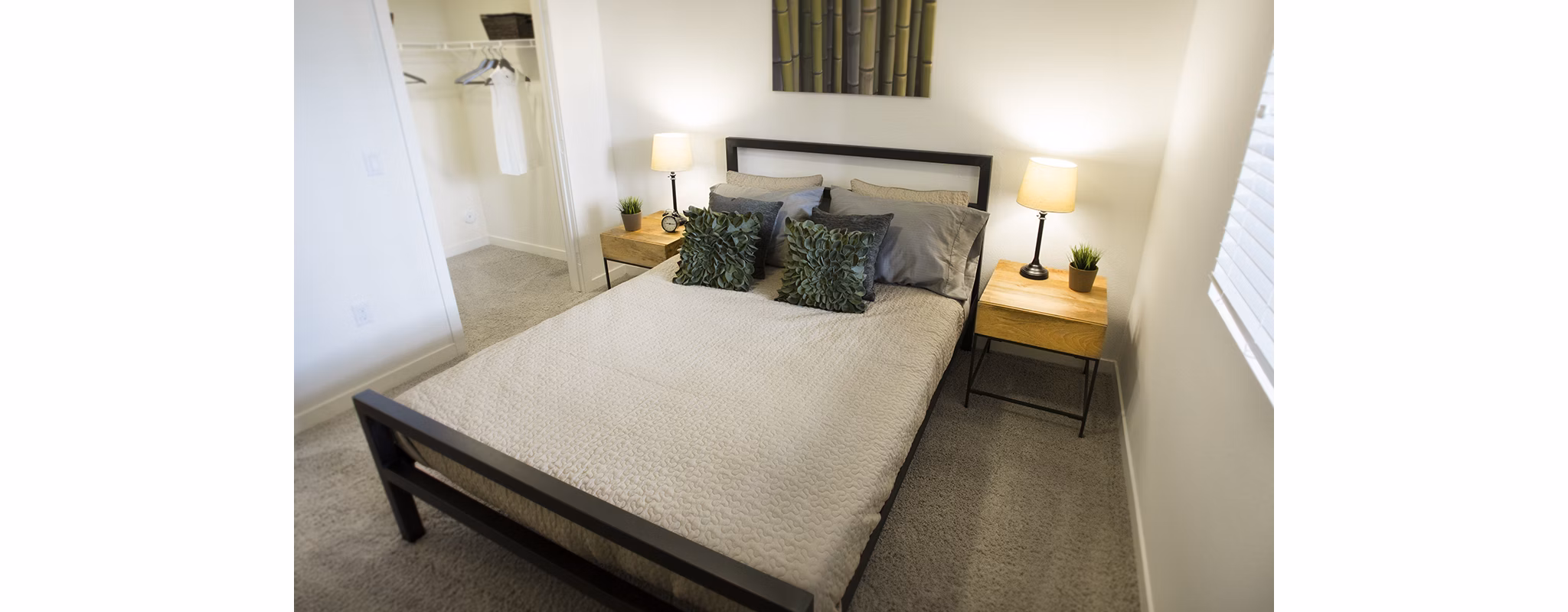 Cozy bedroom with contemporary decor in Eton at Warner Center Apartments