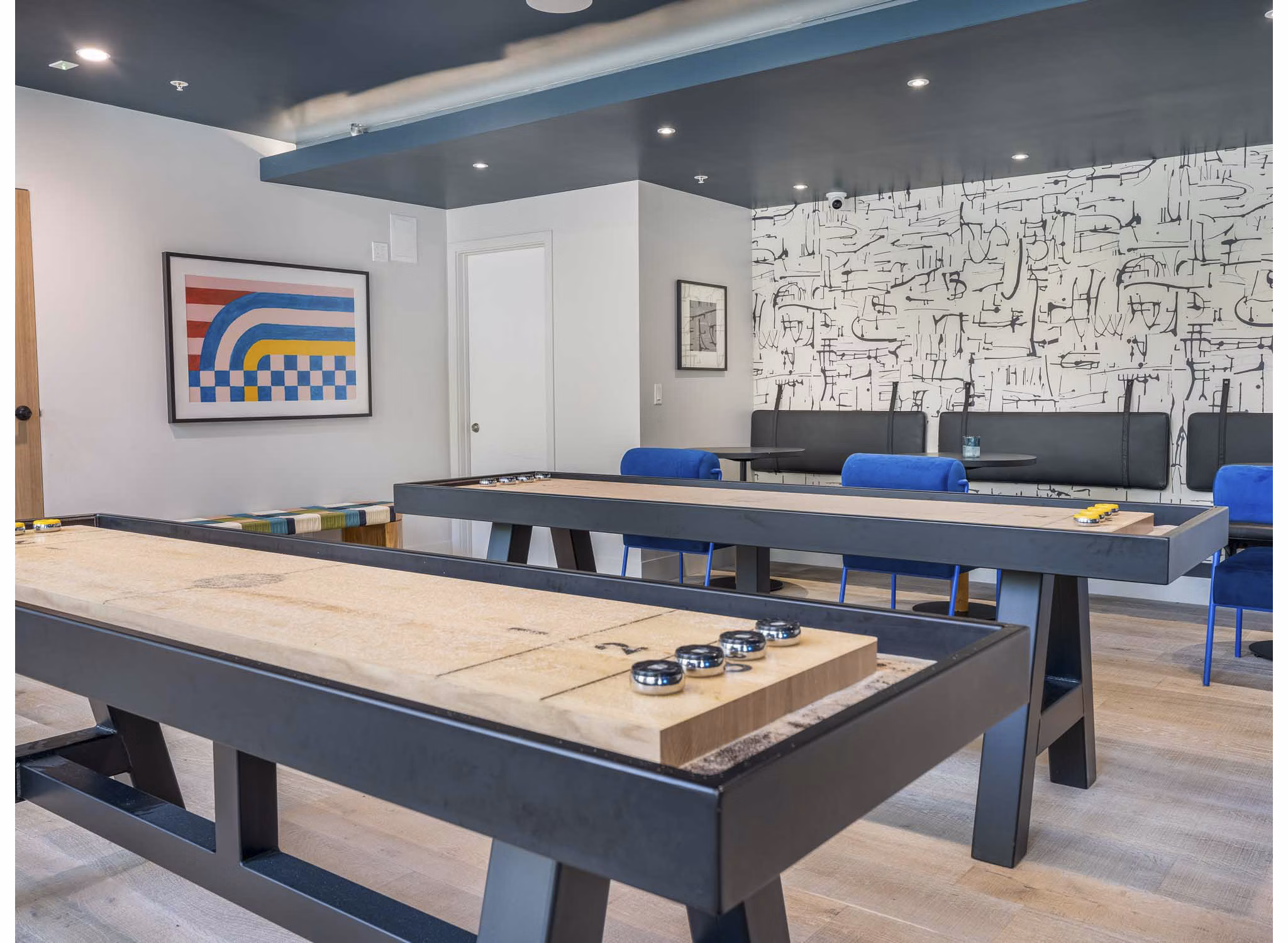 Clubhouse featuring modern design and comfortable seating at Eton at Warner Center Apartments
