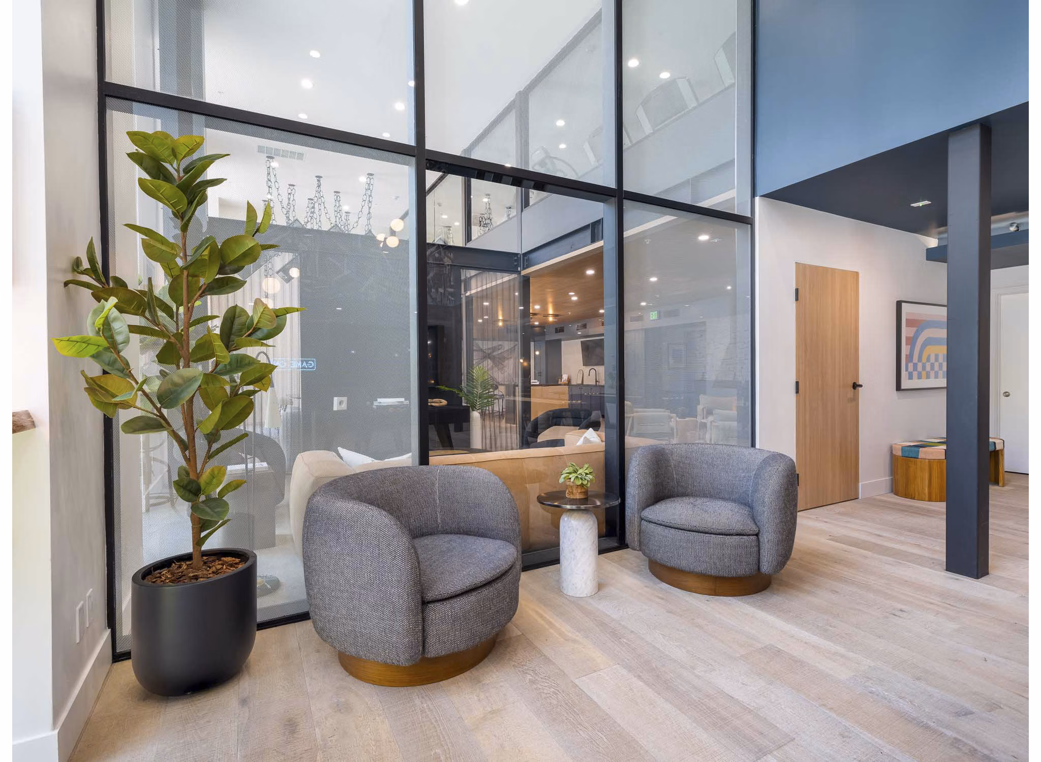 Eton at Warner Center: Modern clubhouse showcasing luxury amenities and stylish design in this premium apartment community