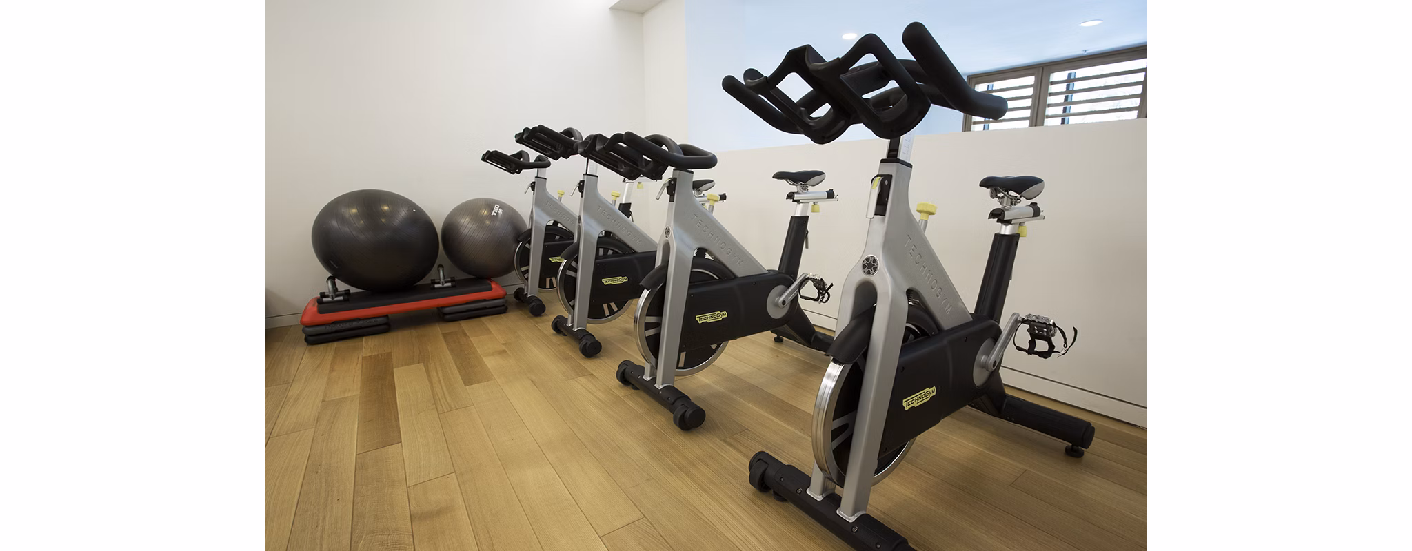 Modern fitness center with state-of-the-art equipment at Eton at Warner Center Apartments, ideal for an active lifestyle