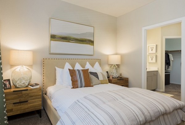 Bedroom with elegant decor and natural lighting at Adobe Ridge Apartments
