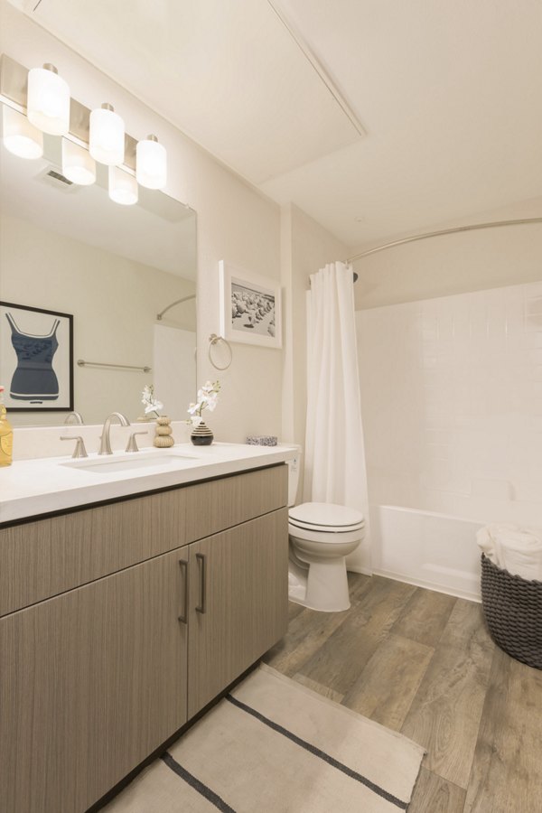 Bathroom featuring elegant marble countertops at Adobe Ridge Apartments