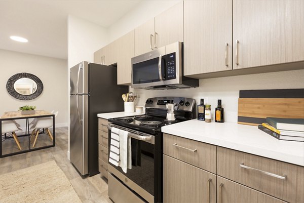 Modern kitchen with stainless steel appliances at Adobe Ridge Apartments