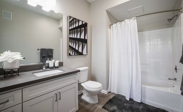 Modern bathroom with sleek fixtures at Canyon Park Apartments in Pet-Friendly Community