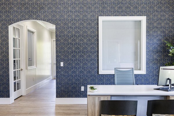 Clubhouse with modern design and seating areas at Canyon Park Apartments luxury community