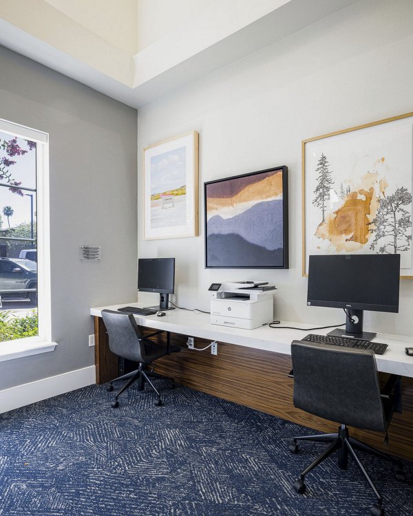 Business center with modern workstations at Canyon Park Apartments