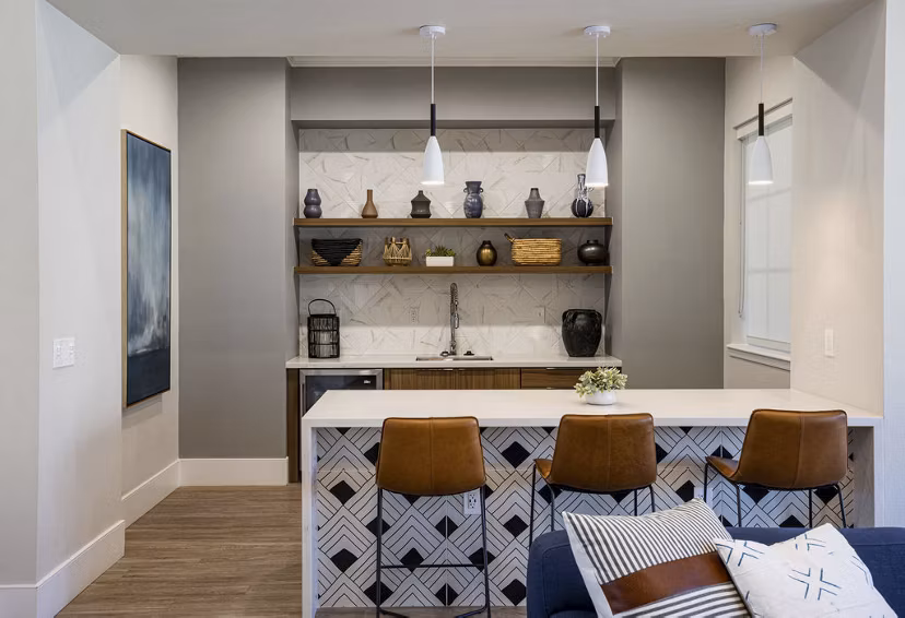 Clubhouse with modern design and community seating at Canyon Park Apartments, offering a luxury lifestyle in a serene setting
